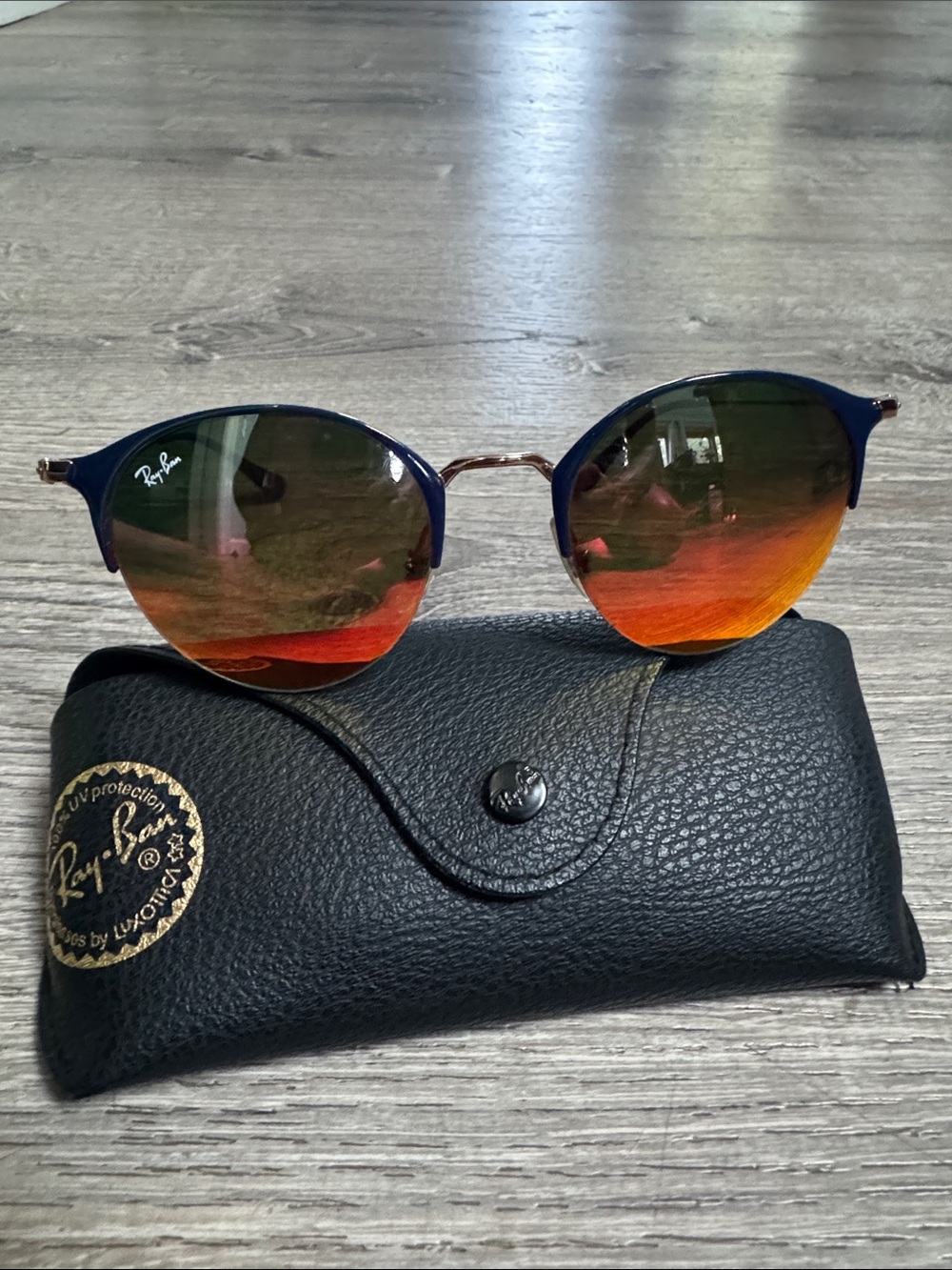 Ray-Ban women’s Round Sunglasses — Blue Frame with Orange Gradient Lenses